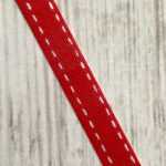 krullint rood met witte strepen