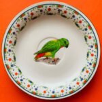 Porselein wandbordje groene parkiet