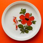 Porselein wandbordje oranje parkiet