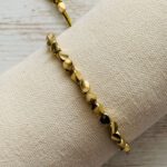 Armbandje Goudhaantje