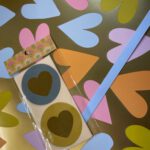 Gold hearts met blauw lint