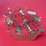 Kerstkaart Mand met kerststuk