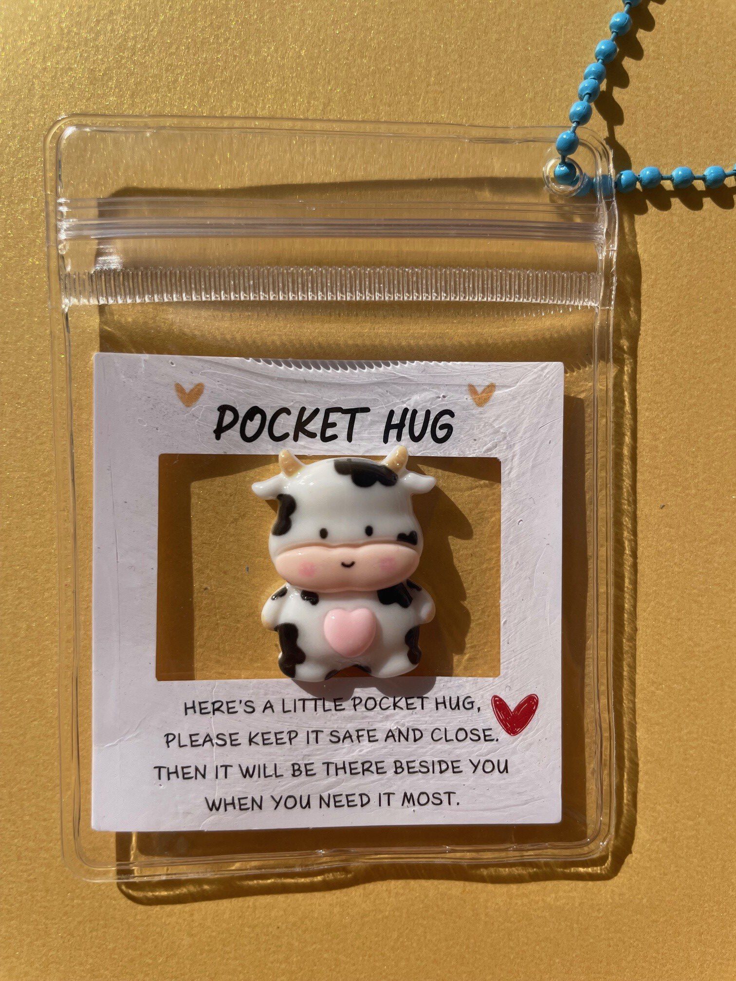 cow Pocket Hug Cow - Image 1