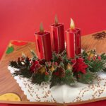 Kerstkaart met Kerststuk en kaarsen