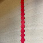 Krullint rood golvend